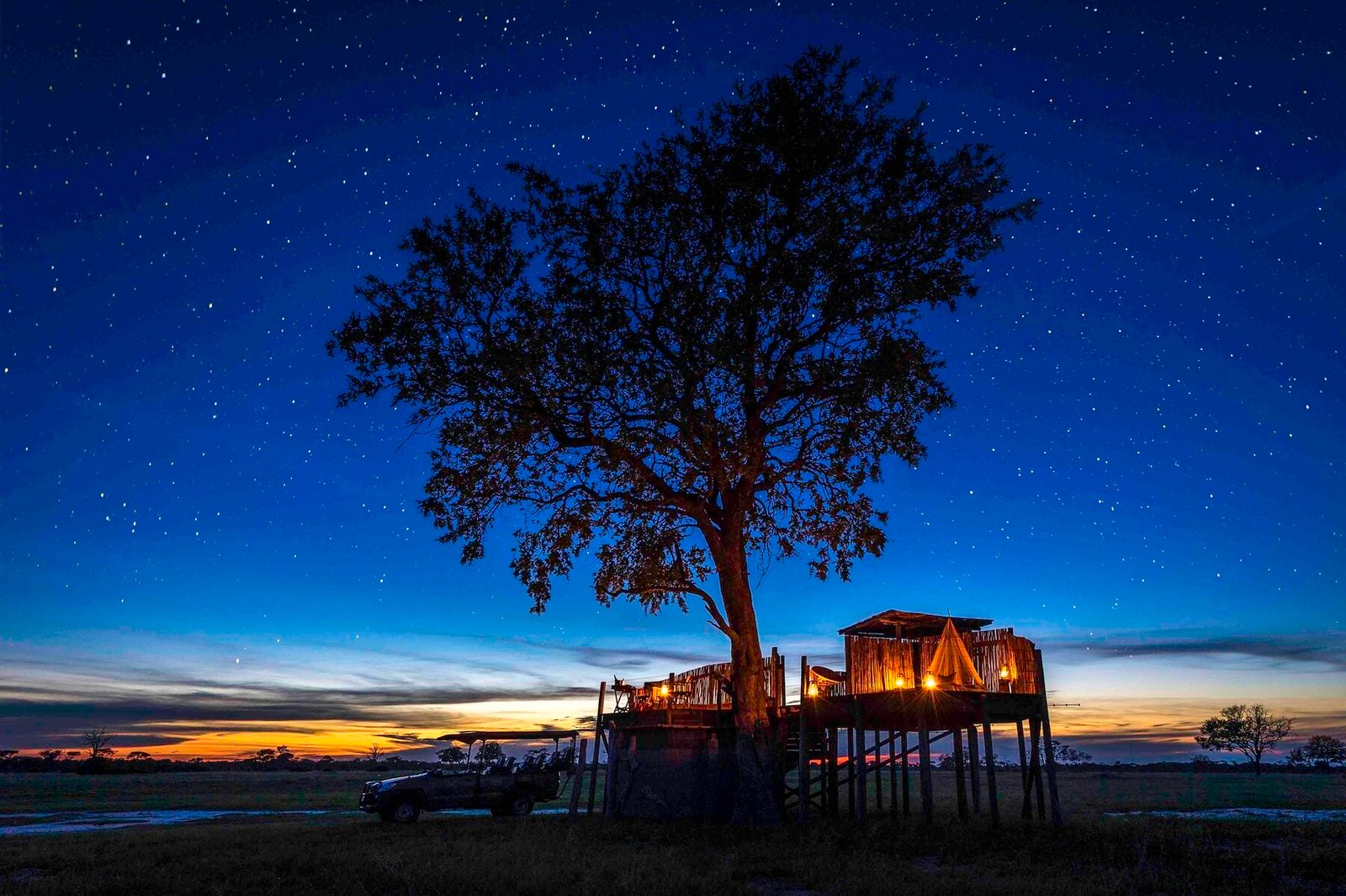 Safari camp beneath the African night sky